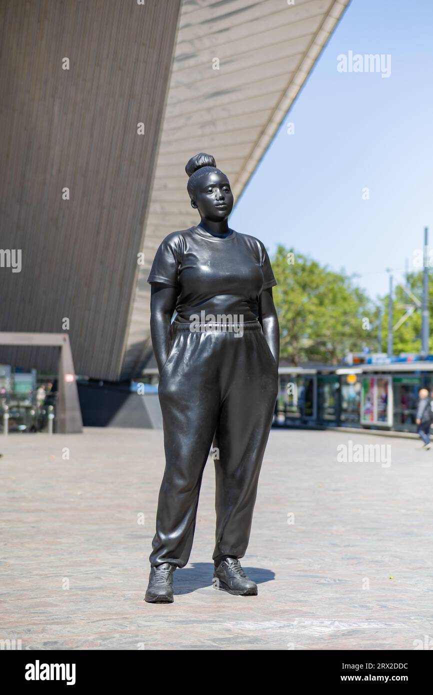 The sculpture Moments Contained by Thomas J. Price at the Central Station in Rotterdam, the Netherlands Stock Photo