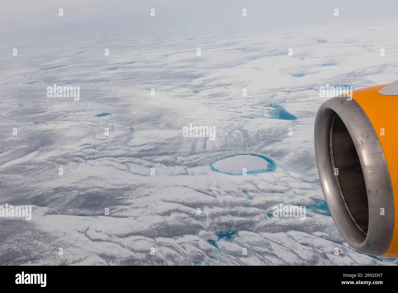 A commercial flight over the Greenland Ice Sheet flying into Kangerlussuaq, Qeqqata municipality, Western Greenland, Polar Regions Stock Photo