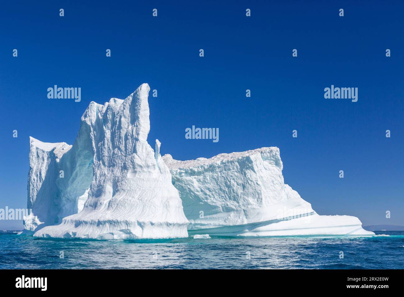 Huge iceberg from the nearby Ilulissat Icefjord floating near Ilulissat, formerly Jakobshavn, Western Greenland, Polar Regions Stock Photo