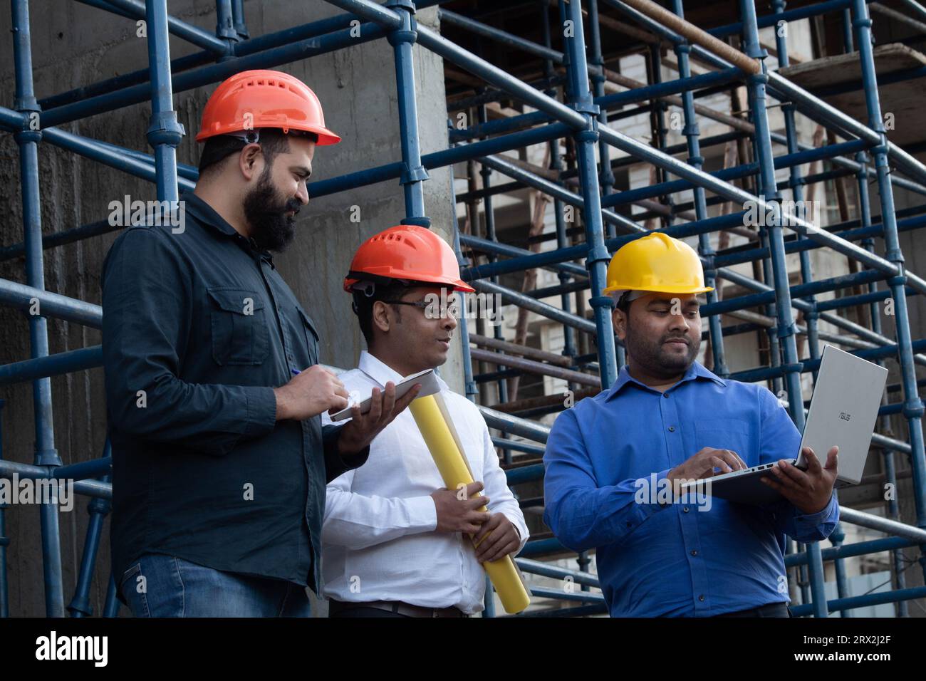 Three engineers from the Construction Industry Development Council