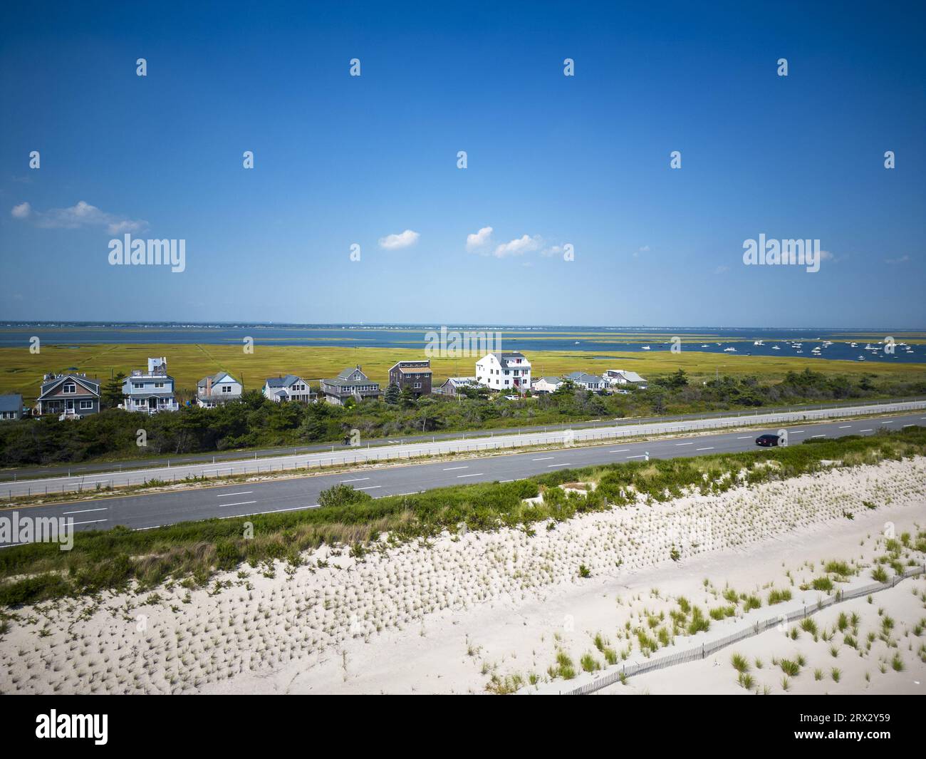 Drone view over the sand dunes of Giglgo Beach at houses and the great south bay on the south shore of Long Island New York. Stock Photo