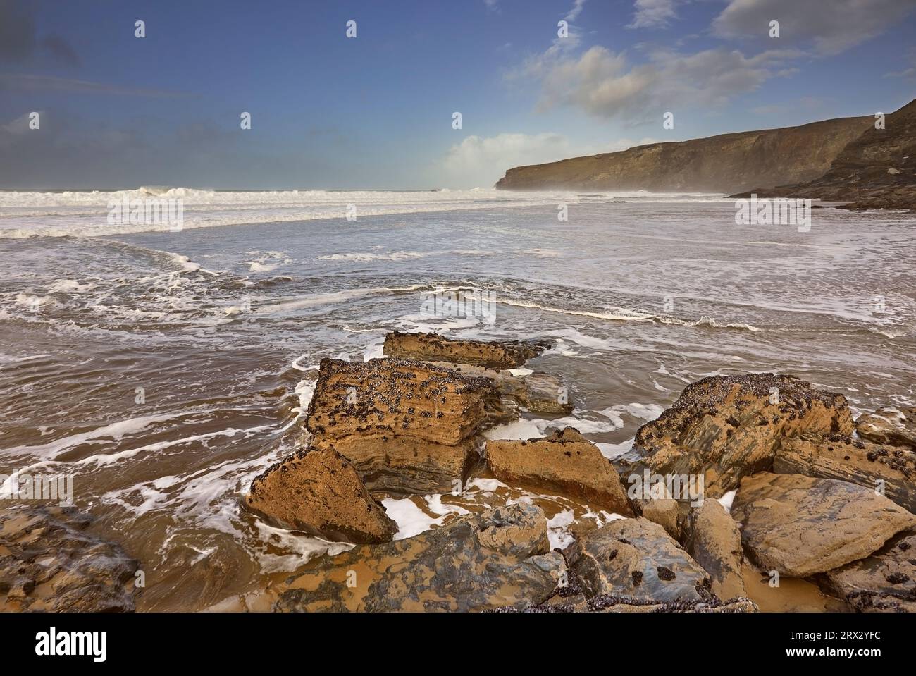 Cliffs and storm clouds of cornwalls atlantic coast hires stock