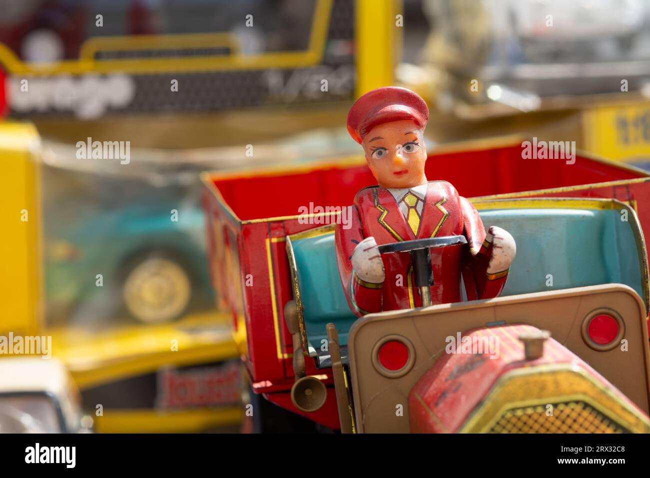 Italy, Lombardy, Flea Market, Old Tin Car Driver Stock Photo