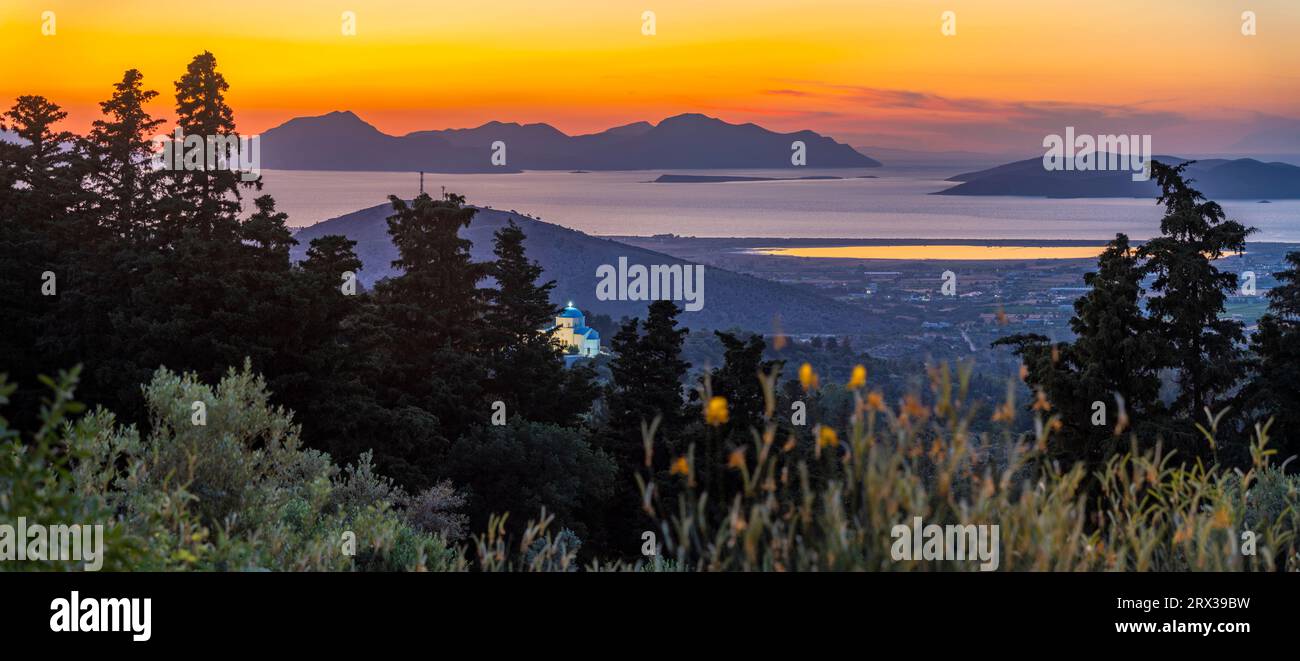 View of Kos Island and Greek Orthodox church from Zia Sunset View at sunset, Zia Village, Kos Town, Kos, Dodecanese, Greek Islands, Greece, Europe Stock Photo