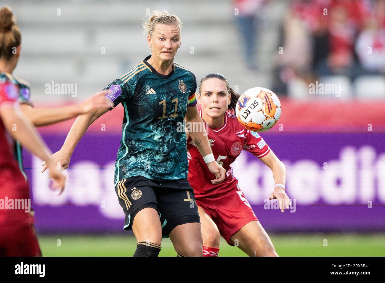 Denmark's Simone Boye, right, and Germany's Alexandra Popp fight for ...