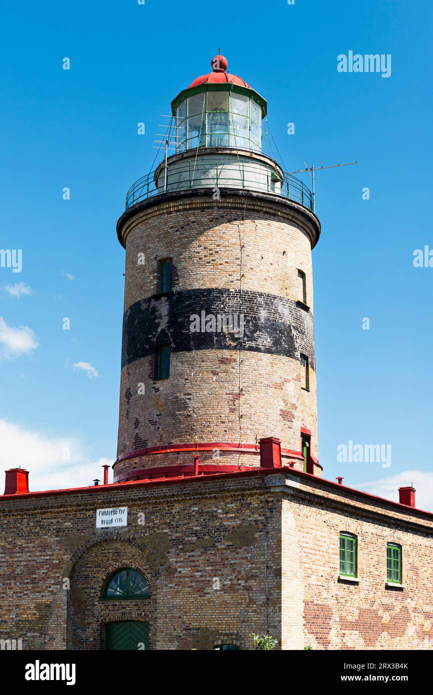 The lighthouse Falsterbo fyr on the coast of the peninsula Skanör med Falsterbo at the Öresund in sunlight, Skåne, Sweden Stock Photo