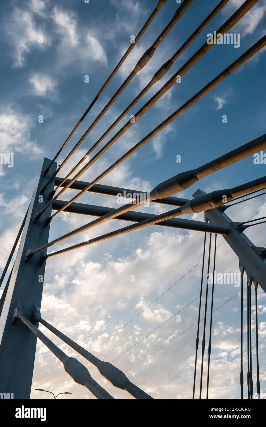 modern metal cable bridge imeni Kaczorowskiego on blue sky background, Lublin Stock Photo