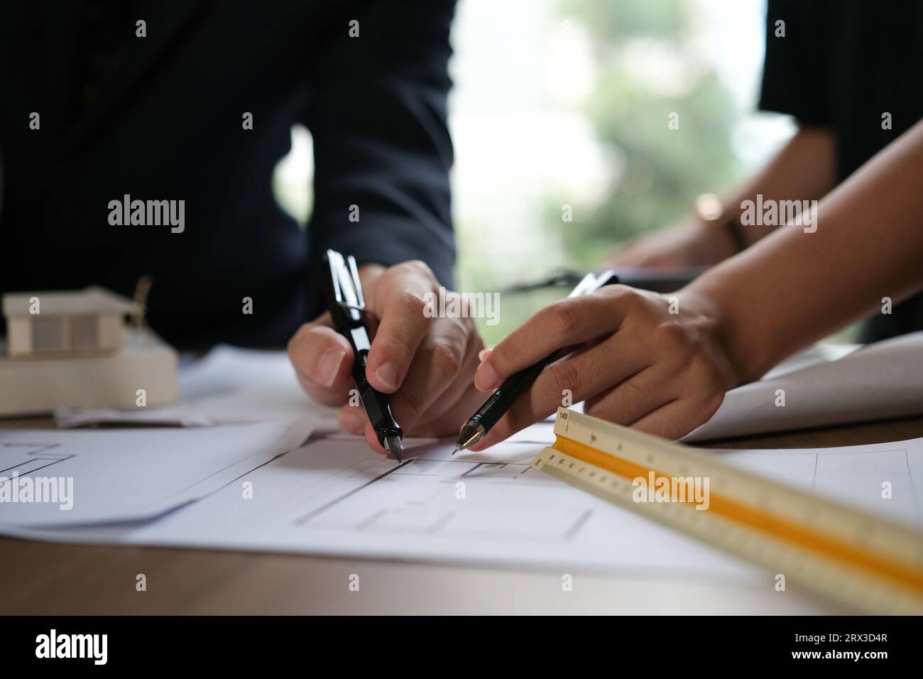 Architect doing consulting teamwork in the office. Stock Photo