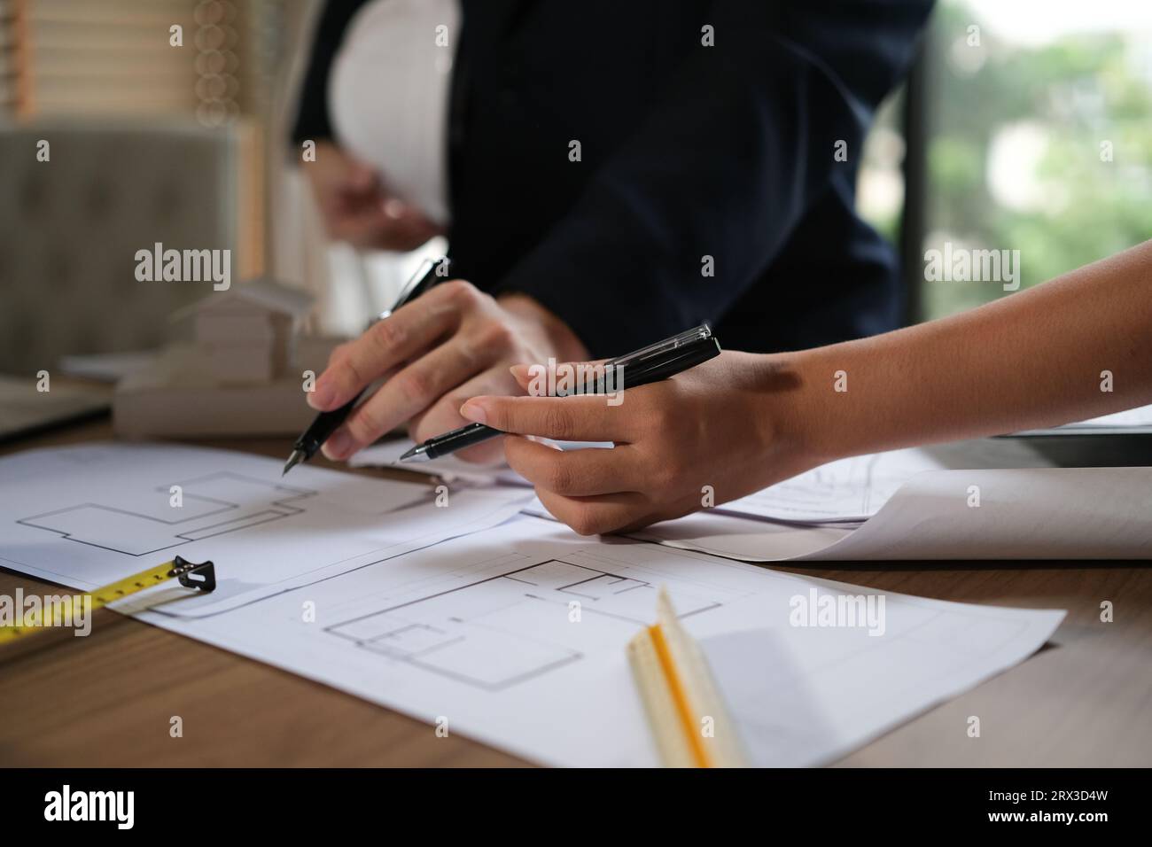 Architect doing consulting teamwork in the office. Stock Photo