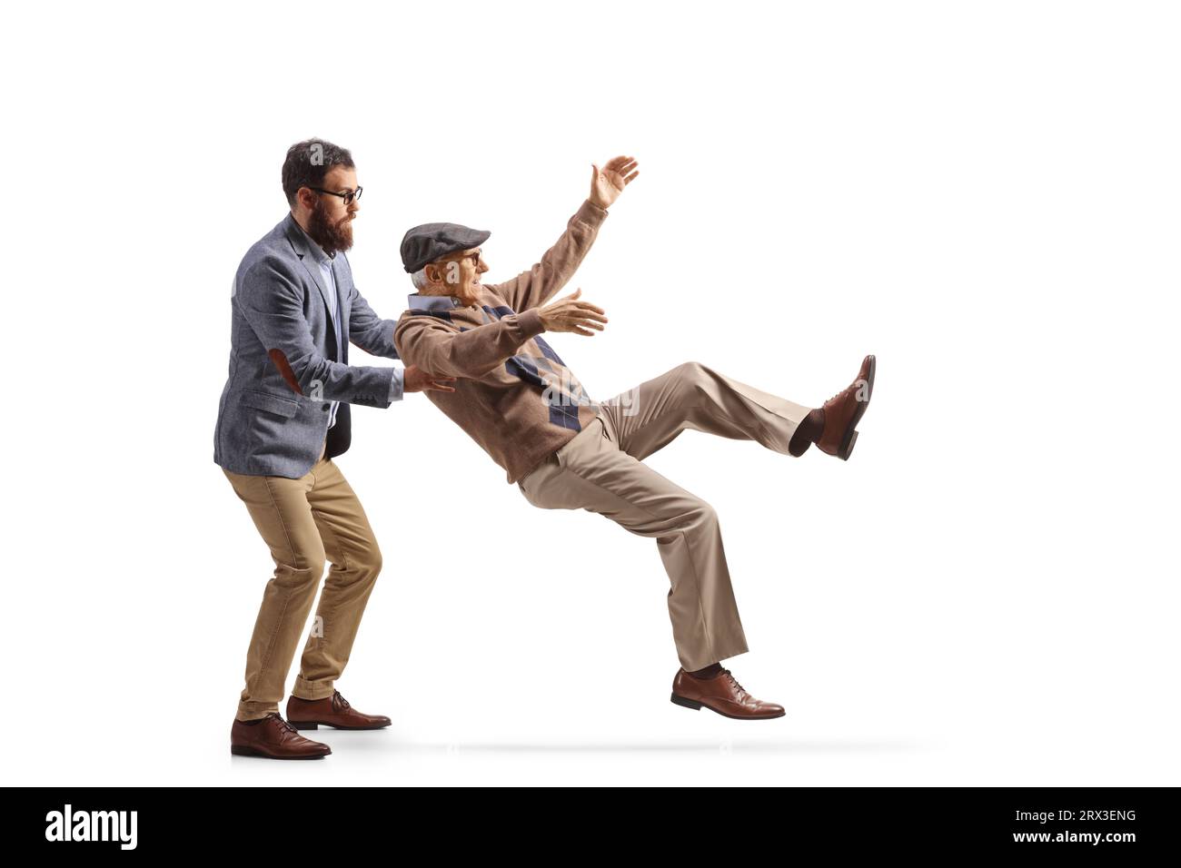 Younger man catching an elderly man falling isolated on white ...