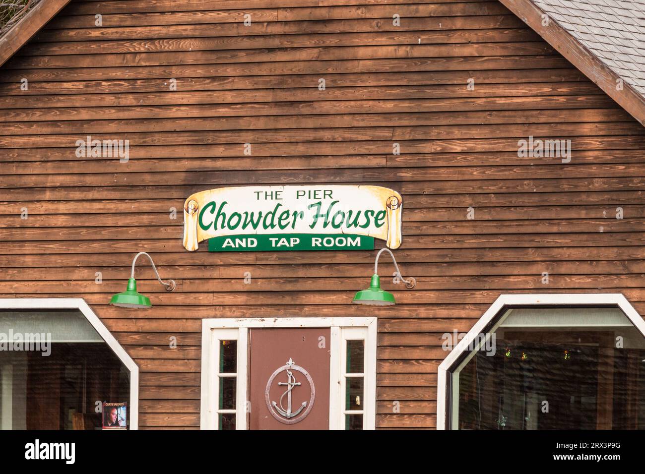 Sign on Chowder House and Tap Room adjacent to the Pier at Point Arena Cove in Point Arena in Northern California. Stock Photo