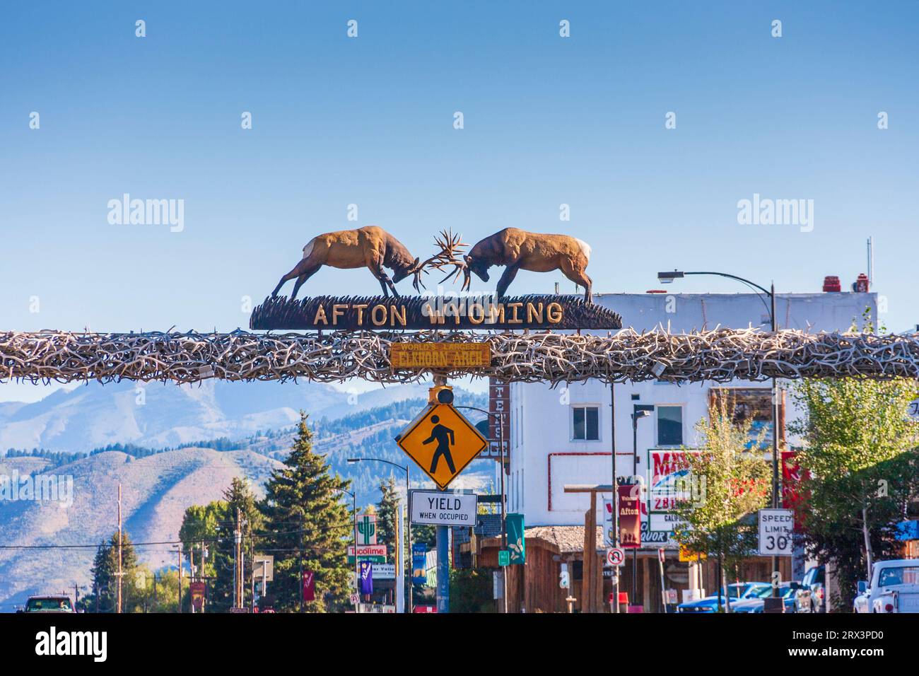 Welcome to Afton, Wyoming, sign atop arch made of elk horns. Stock Photo