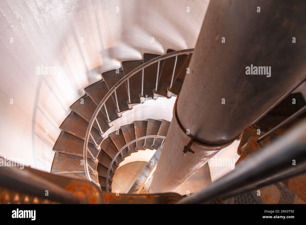 Curved Stairway ascending to the top of the tower at Point Arena Lighthouse, near Point Arena, on the pacific coast of northern California. Stock Photo