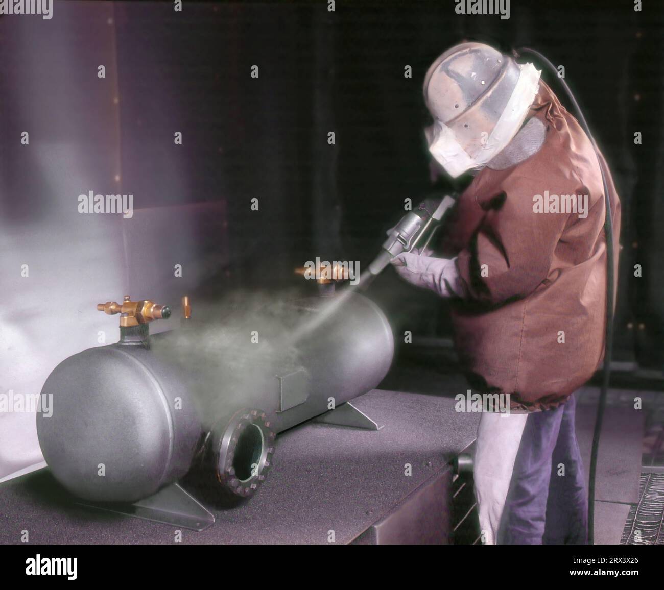 Sandblasting is process of smoothing and cleaning a hard surface by forcing solid particles