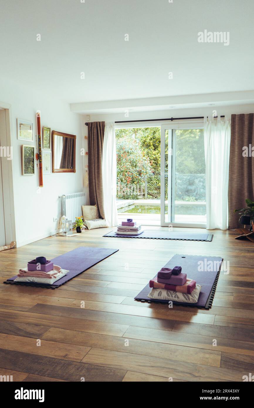 Premium Photo  Peaceful yoga studio interior with soft lighting