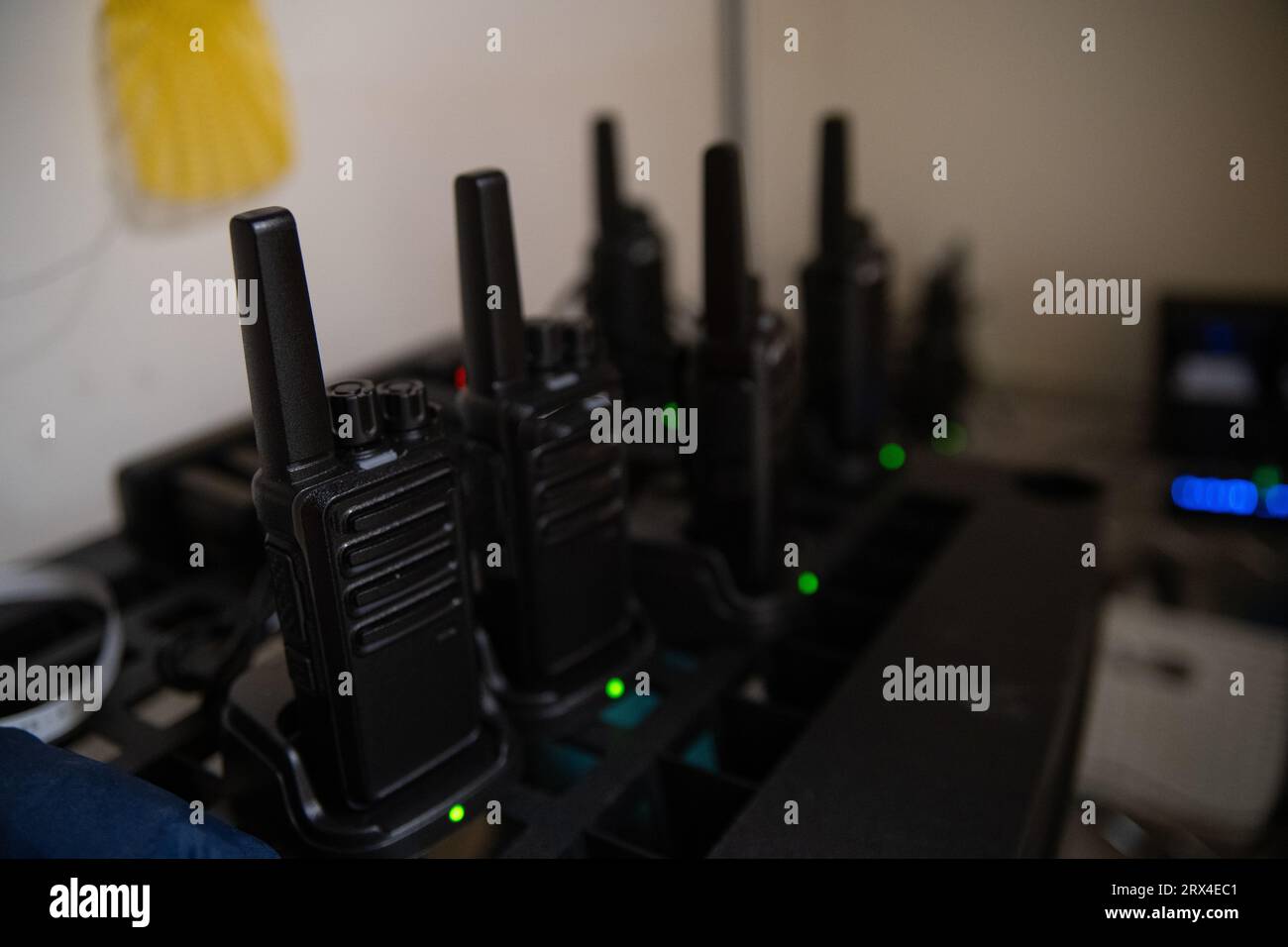 Walkie talkie radio transceiver set up in security office Stock Photo