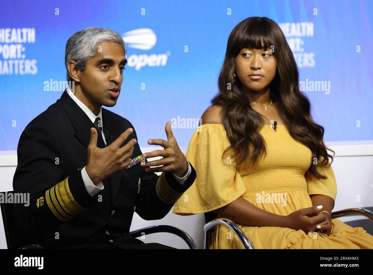 Tennis player Naomi Osaka listens to US Surgeon General  Dr. Vivek H. Murthy during Mental Health and Sport Press conference at US Open on 6 September 2023. Stock Photo