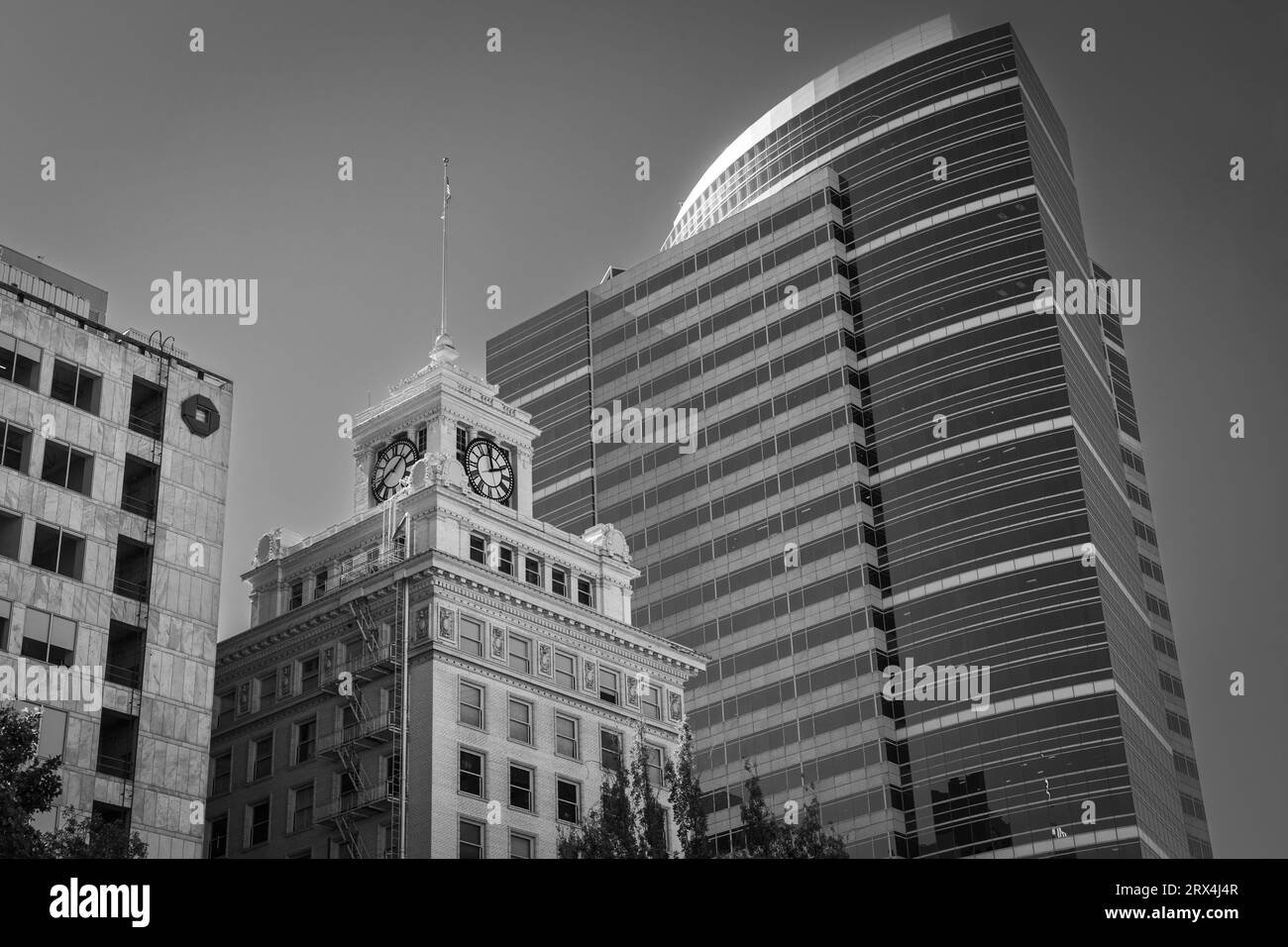 Foxconn Tower and a clock tower in Downtown Portland Oregon Stock Photo