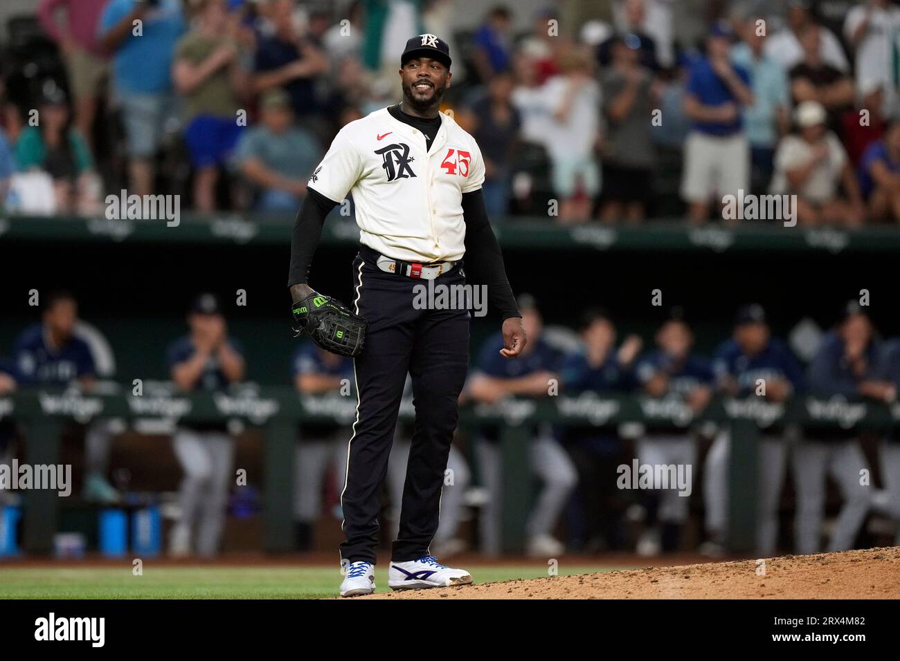Texas Rangers closer Aroldis Chapman smiles during the 9th inning of a ...