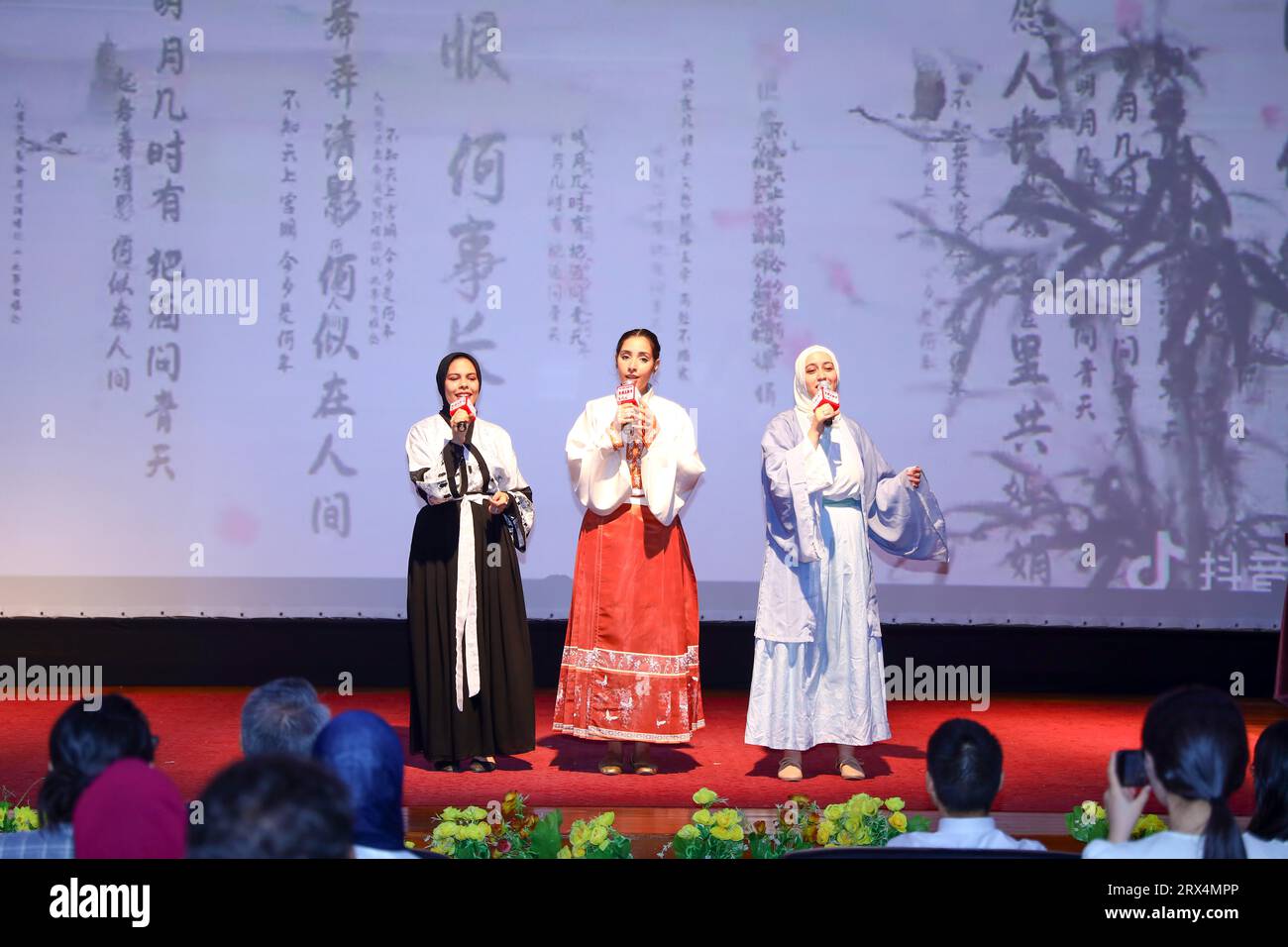 Cairo, Egypt. 21st Sep, 2023. Egyptian students stage a Chinese poetry performance during a ceremony to mark the mid-autumn festival in Cairo, Egypt, Sept. 21, 2023. The China Cultural Center in Cairo marked the upcoming Chinese mid-autumn festival with music and poetry recitations performances on Thursday evening. Credit: Ahmed Gomaa/Xinhua/Alamy Live News Stock Photo