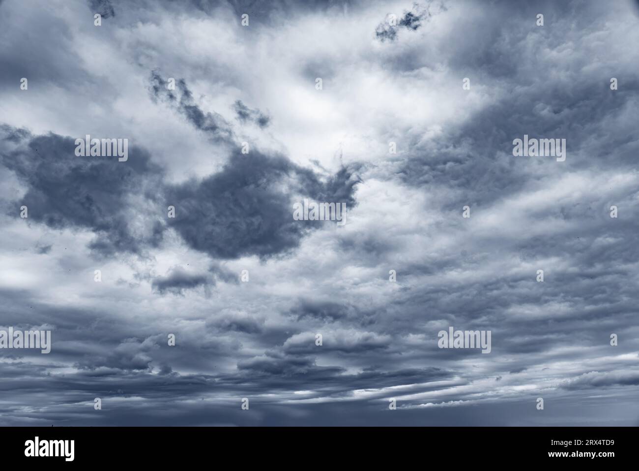 Dark sky with thick thunderclouds Stock Photo