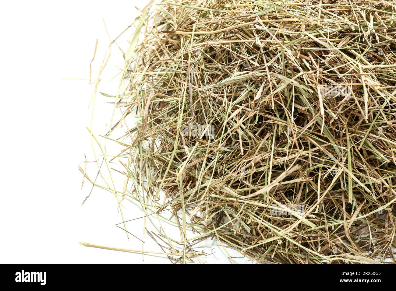 Heap of straw on white background Stock Photo - Alamy