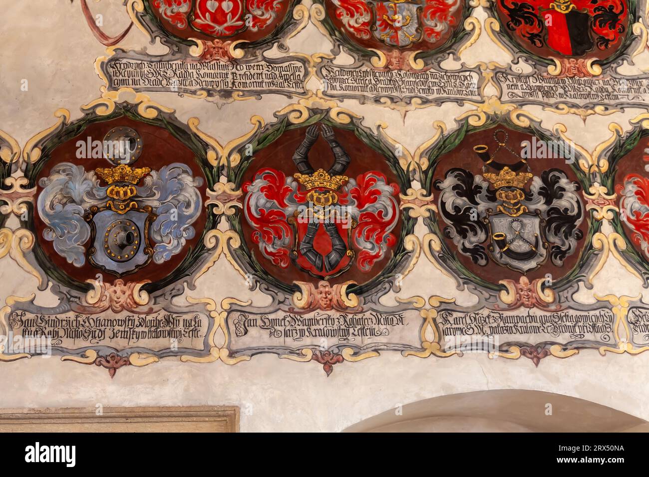 Coats of arms of the noble families on the wall in Old Royal Palace ...