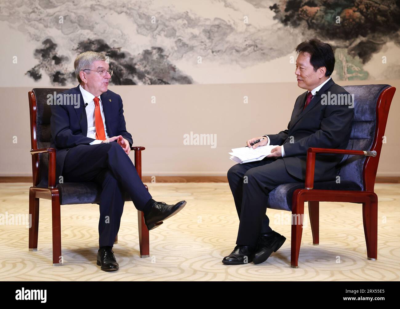 Hangzhou, China's Zhejiang Province. 22nd Sep, 2023. International Olympic Committee (IOC) president Thomas Bach (L) speaks during an interview with Xinhua in Hangzhou, capital city of east China's Zhejiang Province, Sept. 22, 2023. Credit: Cao Can/Xinhua/Alamy Live News Stock Photo