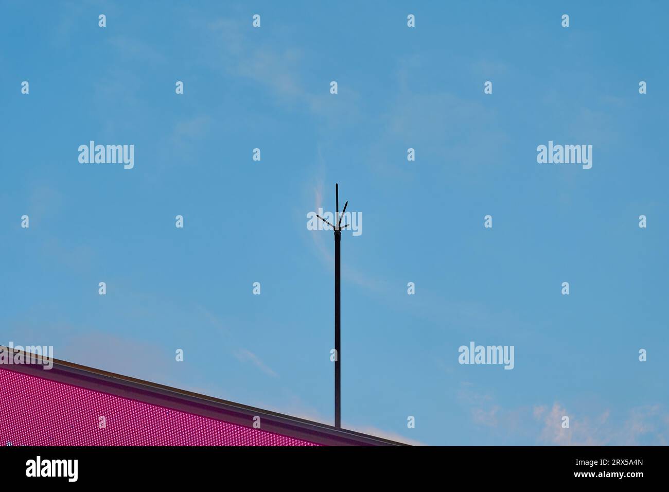 A lightning rod on a billboard under the blue sky Stock Photo - Alamy