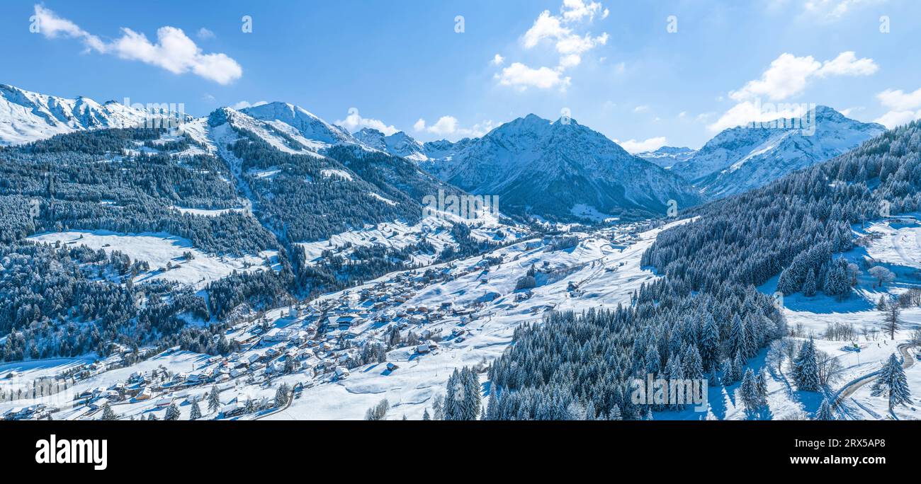 Fantastic view of the Kleinwalsertal region on a beautiful winter day with fresh new snow and sunshine Stock Photo
