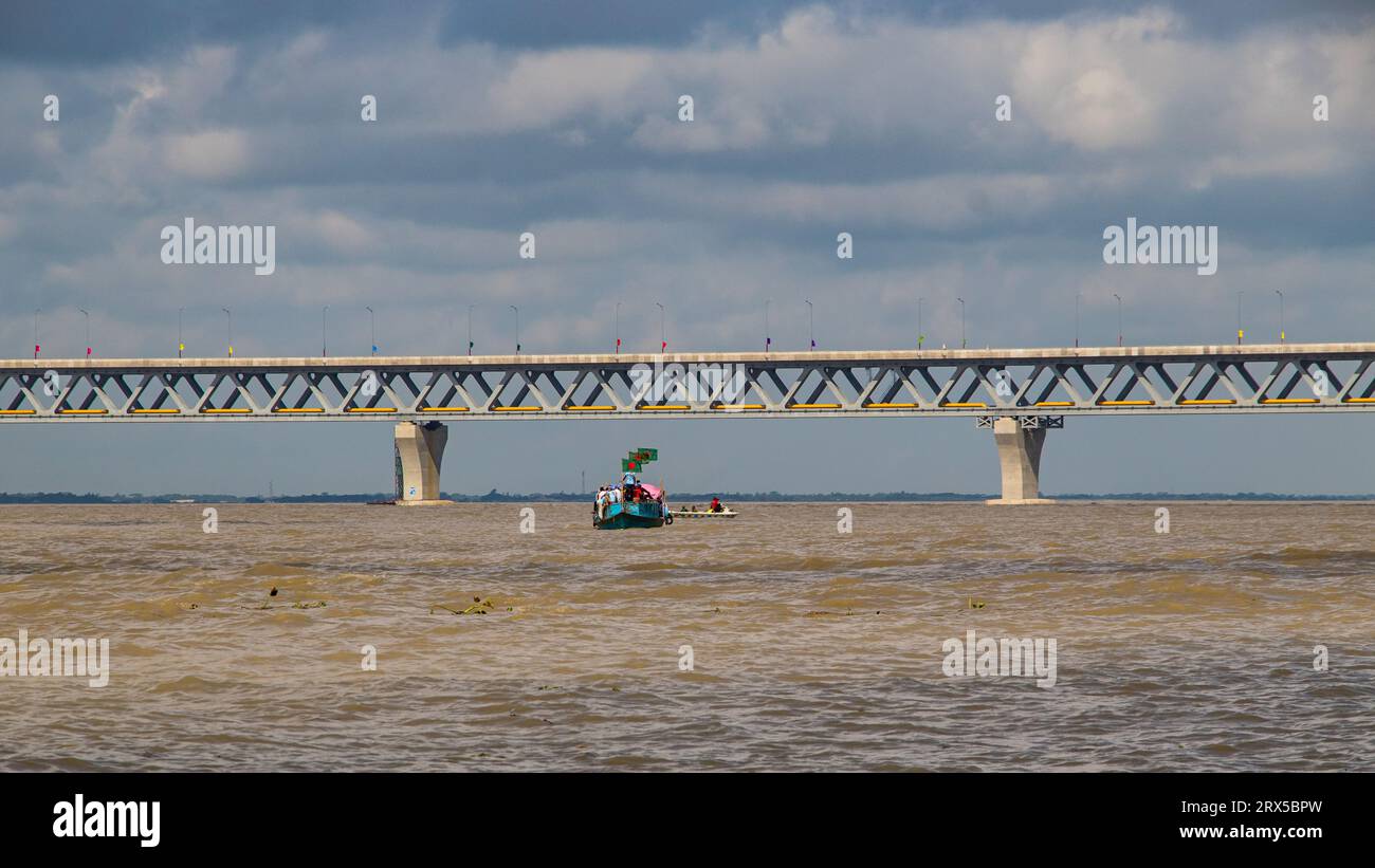 Padma Bridge exclusive 4k image under the beautiful cloudy sky from Padma River, Bangladesh Stock Photo