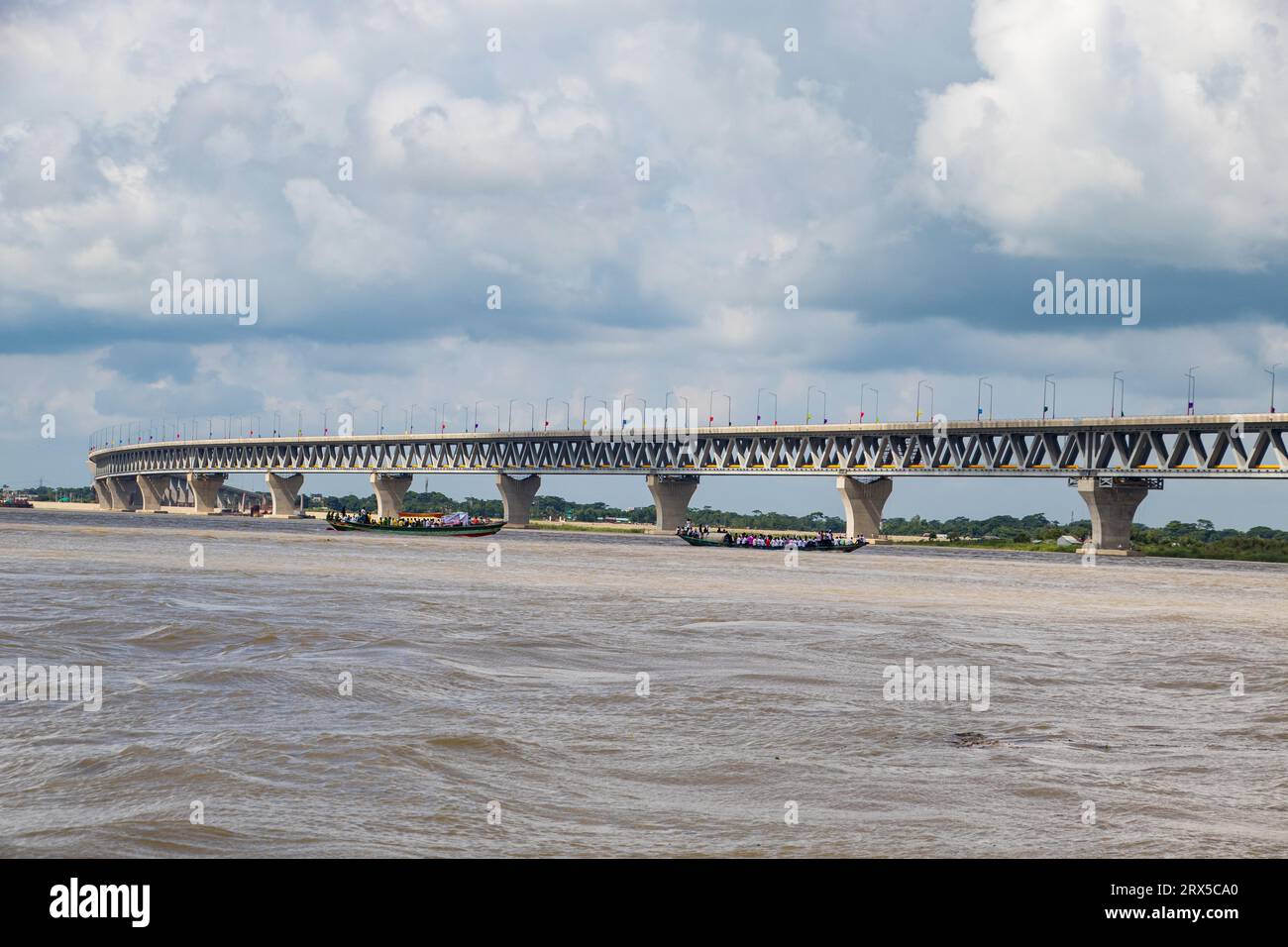 Padma Bridge exclusive 4k image under the beautiful cloudy sky from Padma River, Bangladesh Stock Photo