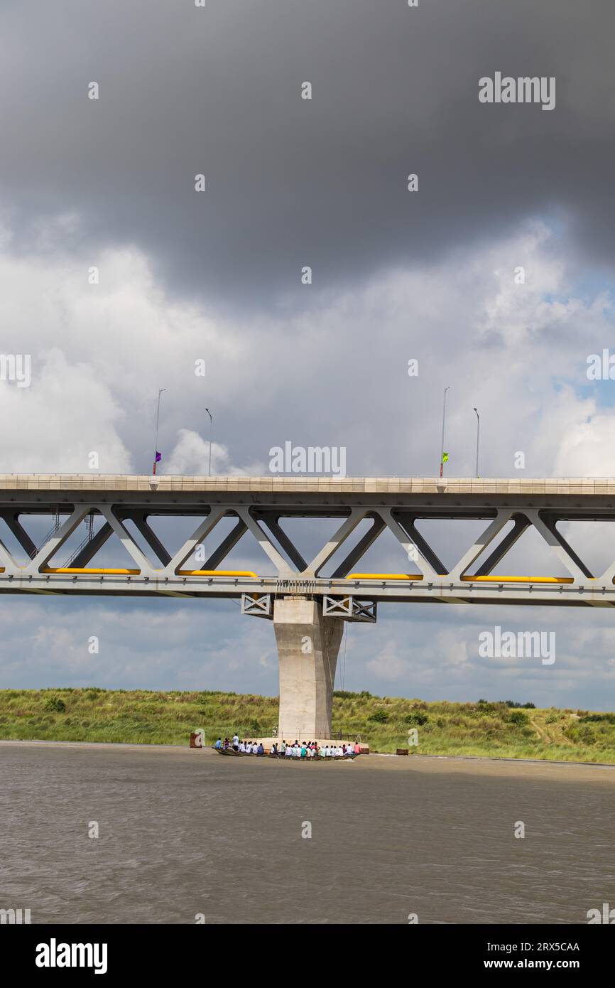 Padma Bridge exclusive 4k image under the beautiful cloudy sky from Padma River, Bangladesh Stock Photo