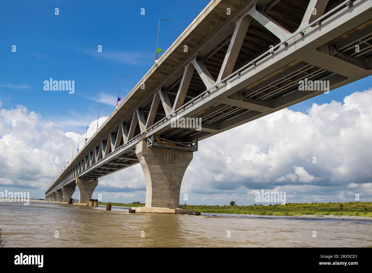 Padma Bridge exclusive 4k image under the beautiful cloudy sky from Padma River, Bangladesh