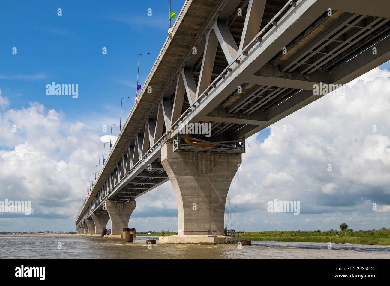 Padma Bridge exclusive 4k image under the beautiful cloudy sky from Padma River, Bangladesh Stock Photo