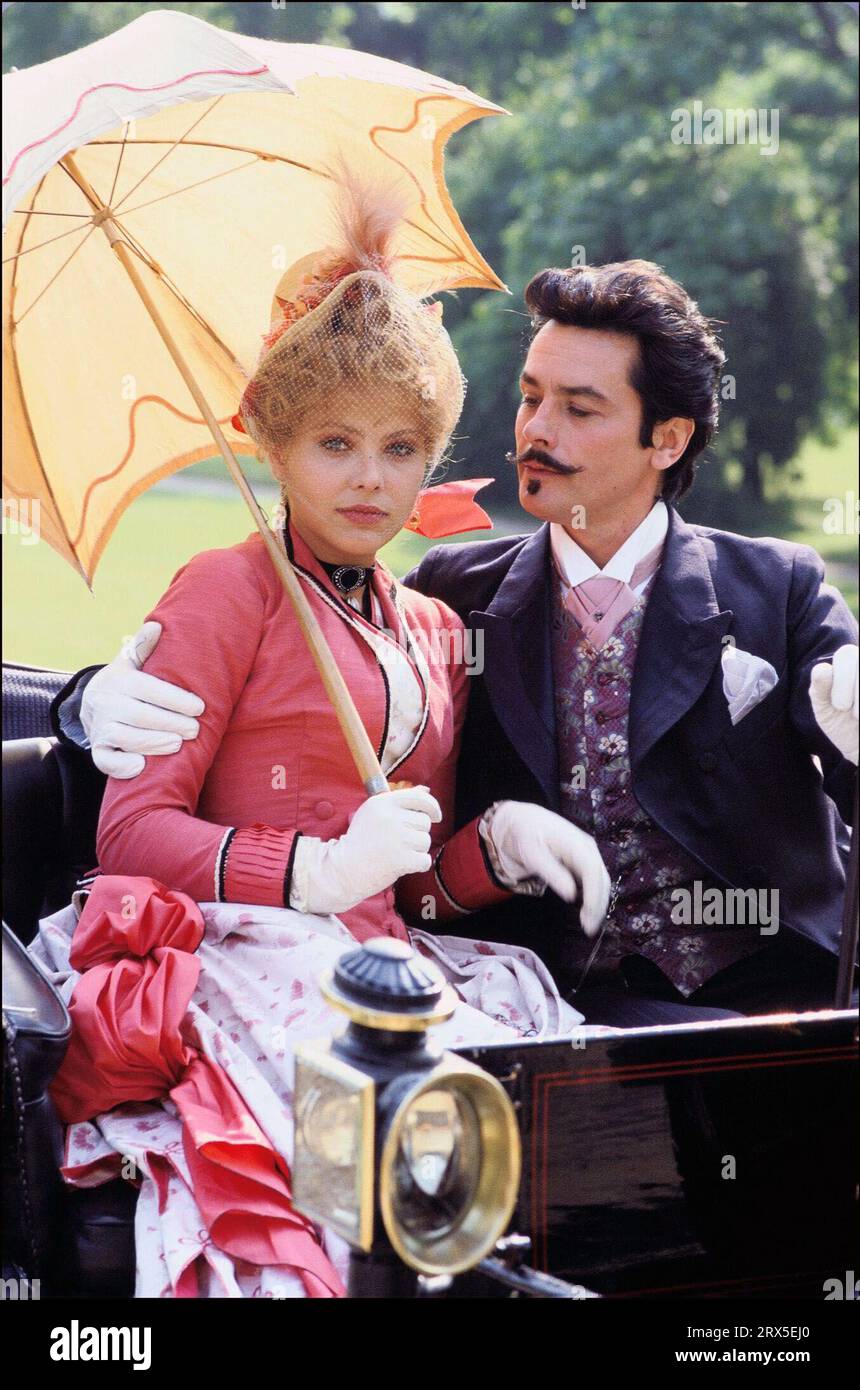 ORNELLA MUTI and ALAIN DELON in SWANN IN LOVE (1984) -Original title: UN AMOUR DE SWANN-, directed by VOLKER SCHLONDORFF. Stock Photo
