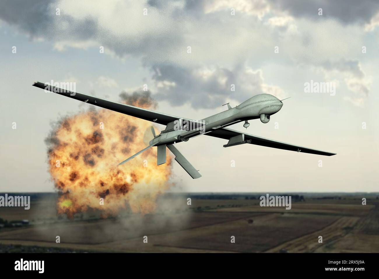 Combat attack drone dropping bombs, blowing up military facilities, flying in the clouds, aerial view, explosion of fire and smoke, war in Ukraine Stock Photo