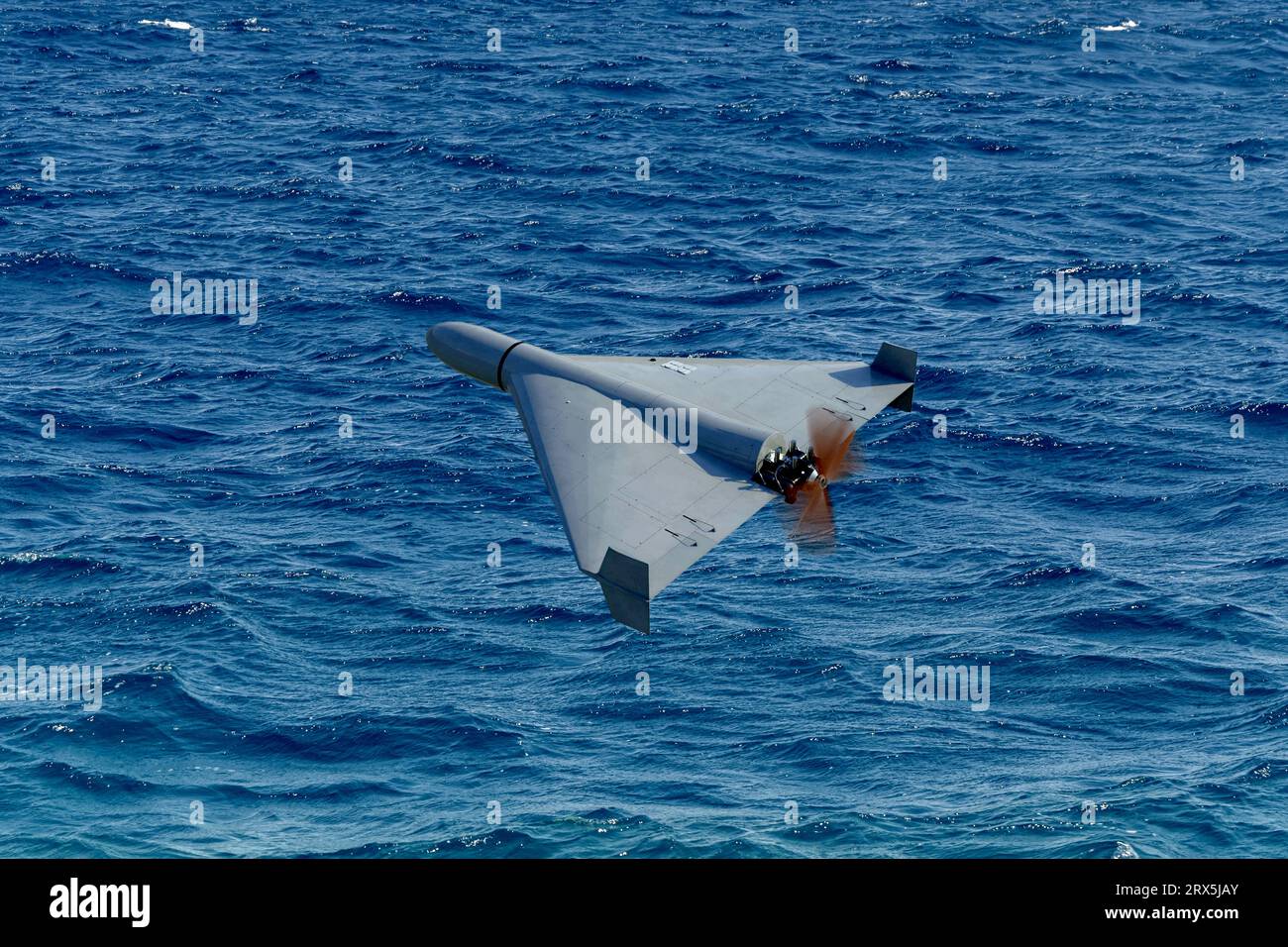 drone flying over the sea, war in Ukraine, airstrike from the sea, Stock Photo