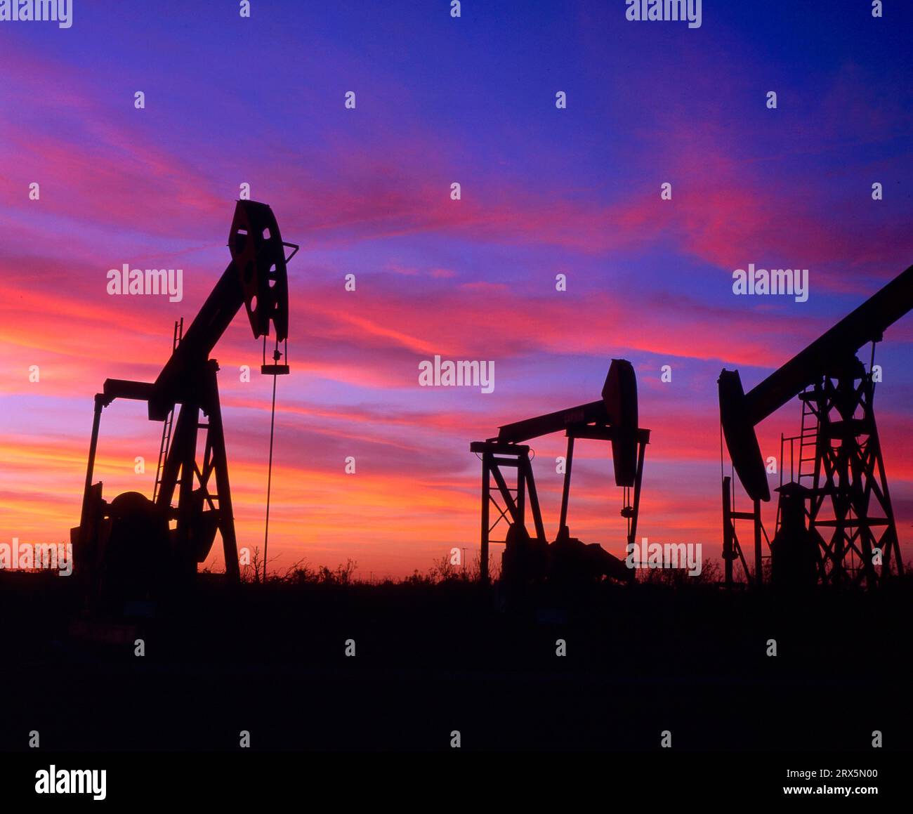 Crude oil production, preventer, deep pump, sunset, twilight