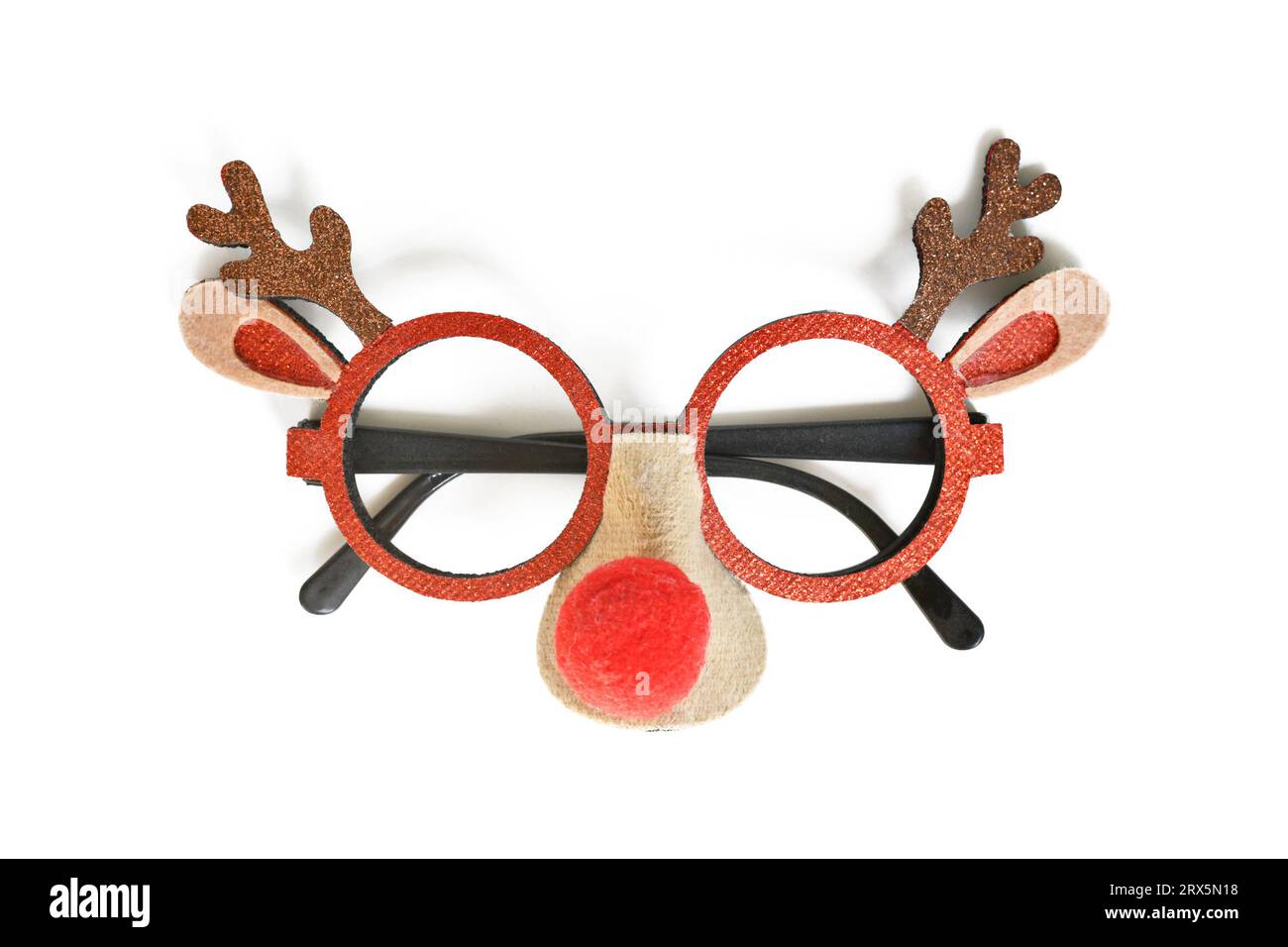 Funny Christmas reindeer eyeglasses on white background Stock Photo
