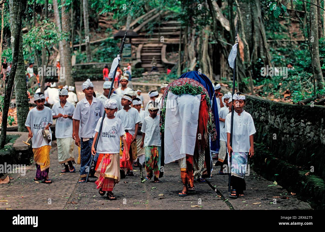 Believing boys, Hindu temple Monkey Forest, Ubud, Bali, Believers, Indonesia Stock Photo