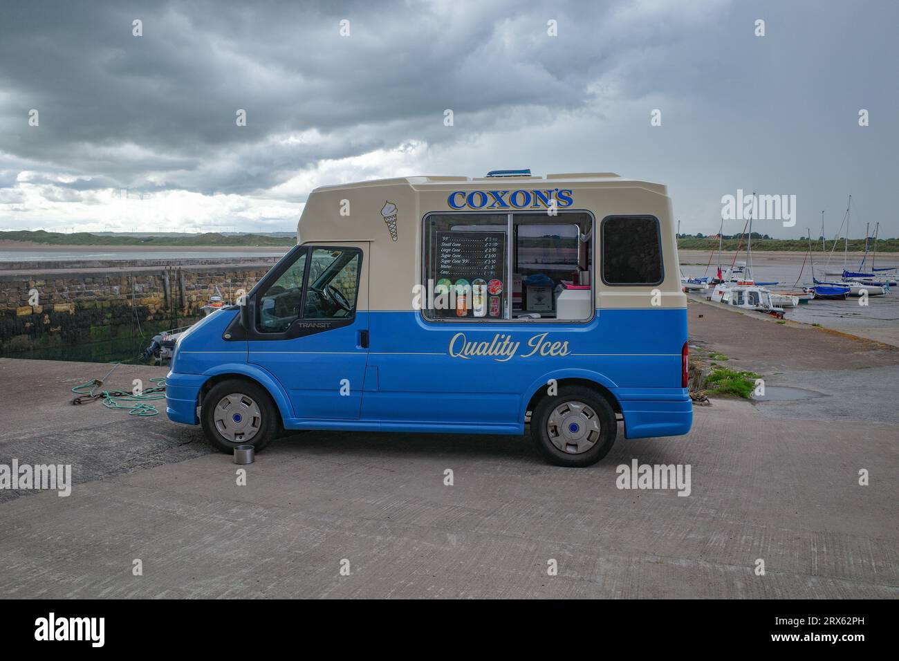 Beadnell, UK - 12 July, 2023: Ice Cream van on Beadnell beach, Northumbria Stock Photo