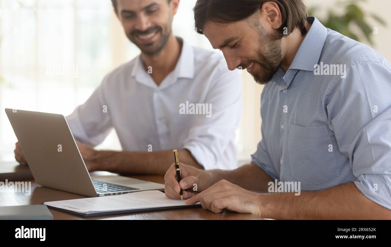 Two entrepreneurs making profitable deal concludes contract Stock Photo ...