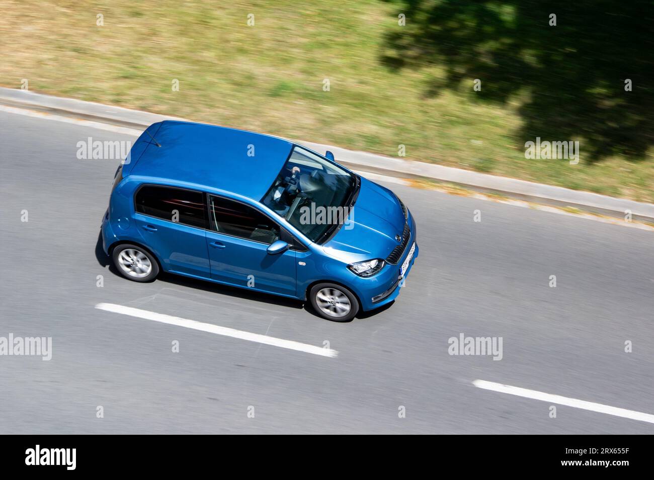 OSTRAVA, CZECH REPUBLIC - JULY 7, 2023: Blue Skoda Citigo car with motion blur effect in top view Stock Photo