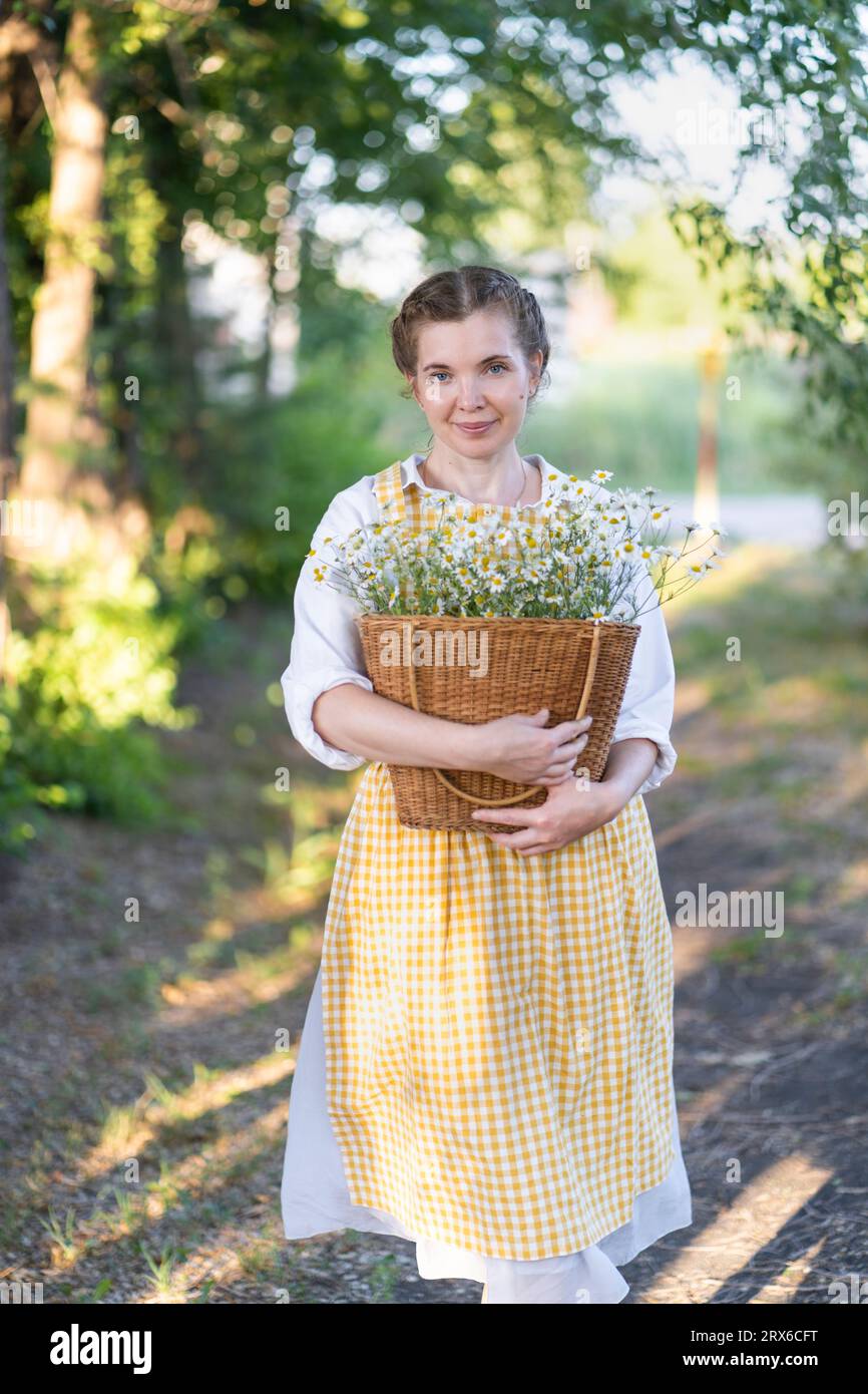 Woman basket hi-res stock photography and images - Alamy