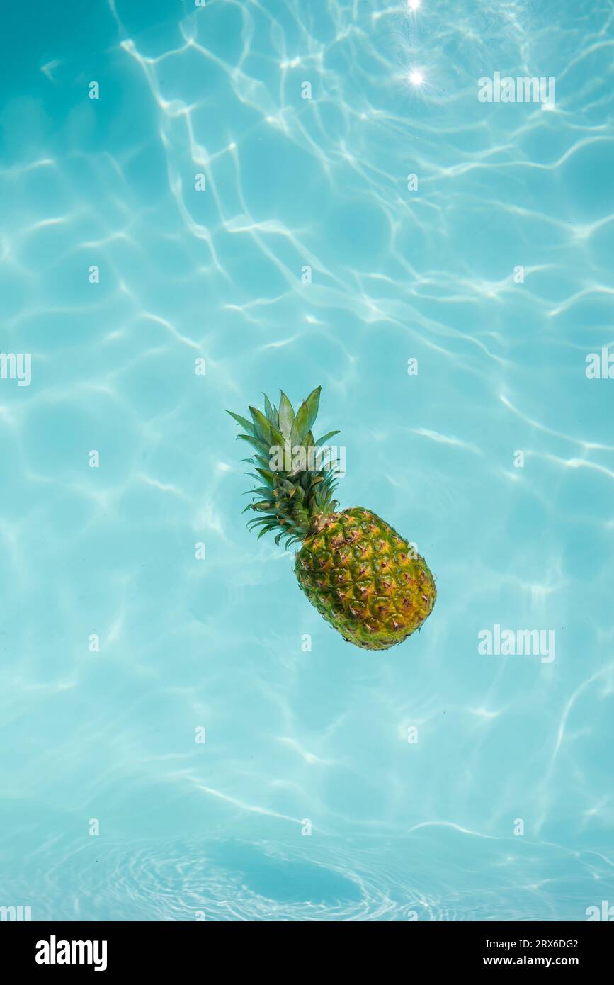 Pineapple floating in water hi-res stock photography and images - Alamy