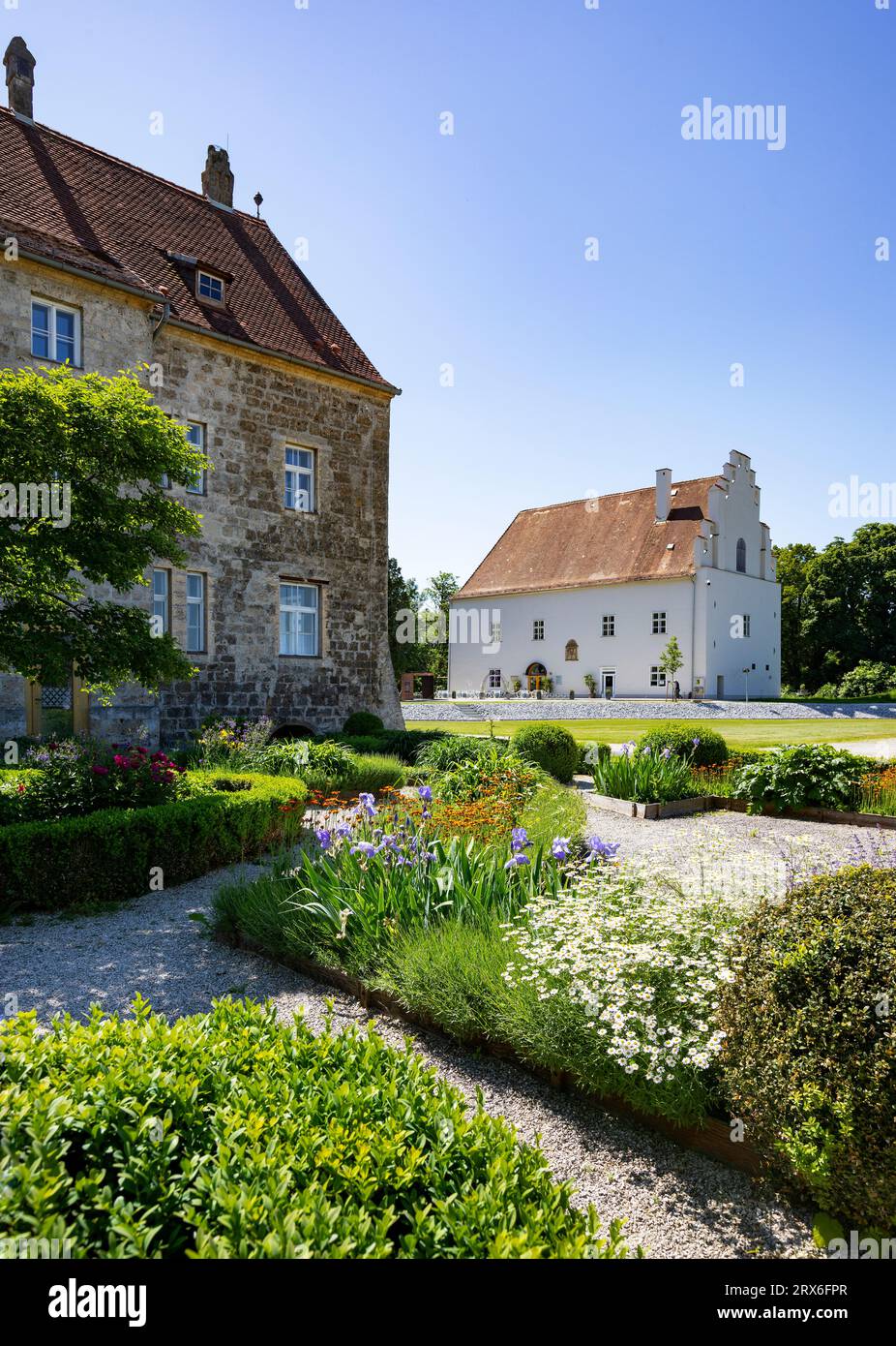 Austria, Upper Austria, Obernberg am Inn, Flowers blooming in garden of Obernberg Castle Stock Photo