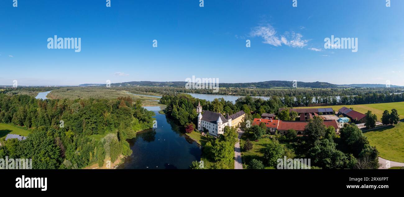 Austria, Upper Austria, Sankt Peter am Hart, Panoramic view of river Mattig and Hagenau Castle Stock Photo