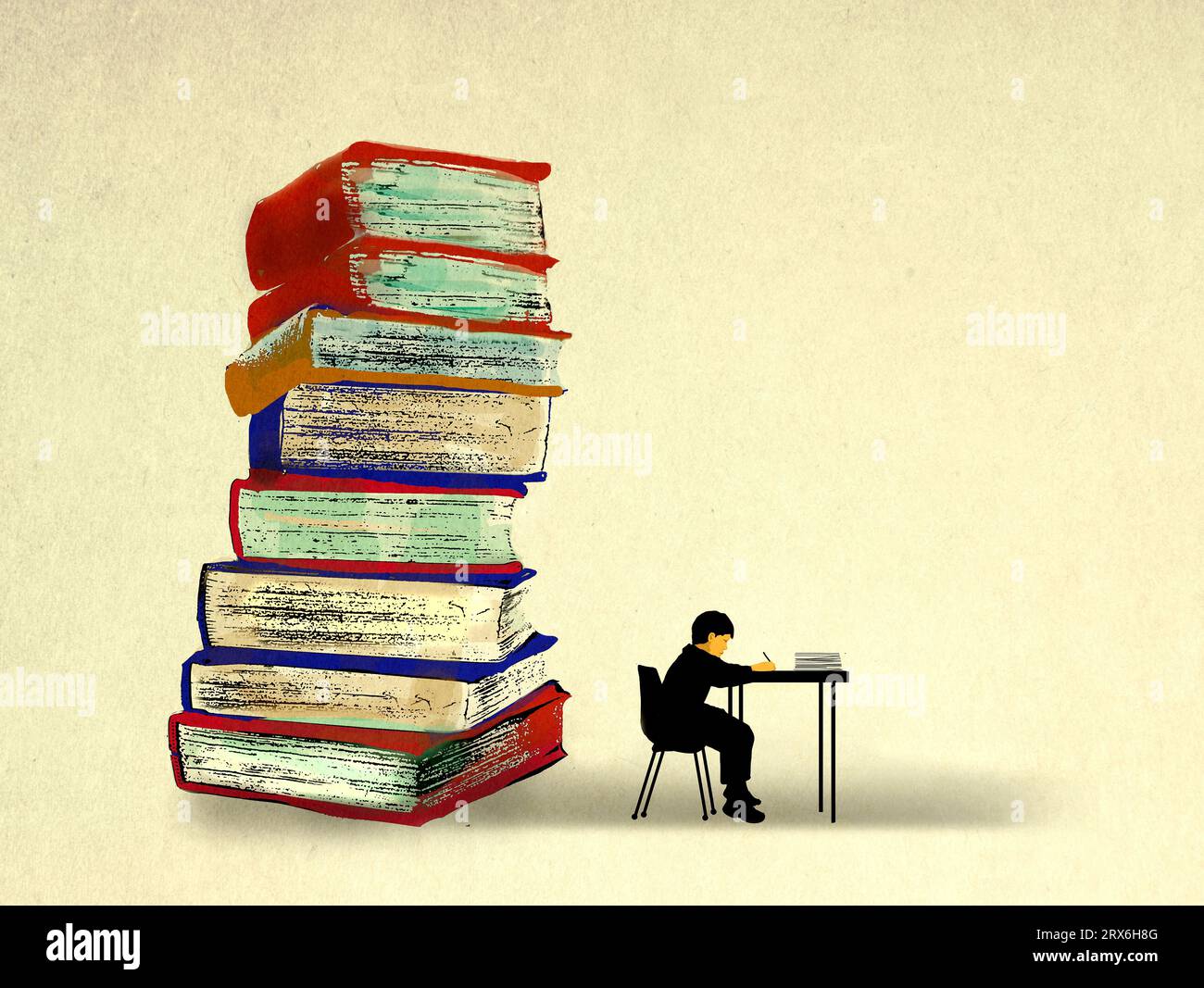 Stack of oversized books behind boy studying at desk Stock Photo Alamy