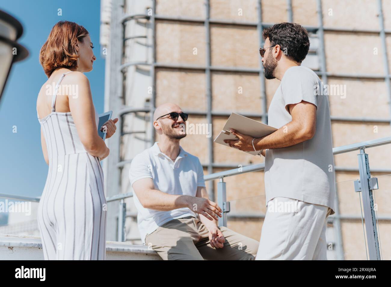 Successful Partners Collaborating on Urban Construction Project Stock Photo